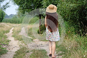 Girl goes on a dirt track.