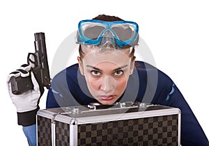 Girl in goggles and gun.