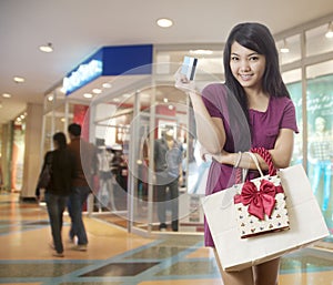 Girl going shopping with credit card
