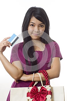 Girl going shopping and showing credit card