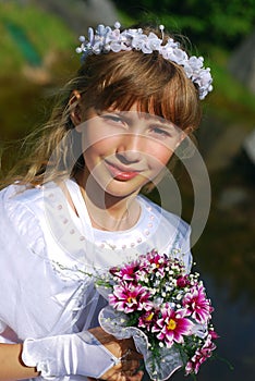 Girl going to the first holy communion in sepia