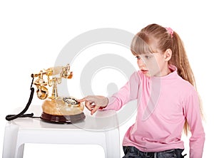 Girl with gold retro telephone.