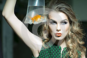 girl with goldfish