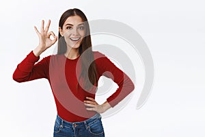 Girl got everything under control. Assertive creative pretty girlfriend in red sweater deal with trouble easily, have no