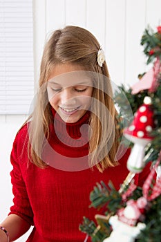 Girl grabs gift on christmas