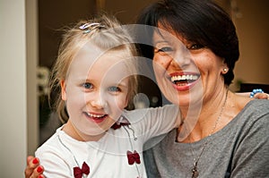 Girl and grandmother smiling