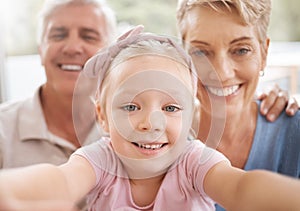 Girl, grandparents and family selfie portrait in home having fun spending quality time together. Love, support and