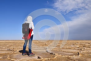 Girl on the Great Salt Desert in Iran