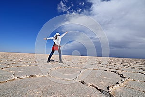 Girl on the Great Salt Desert in Iran