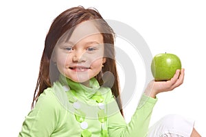 A girl with a green apple