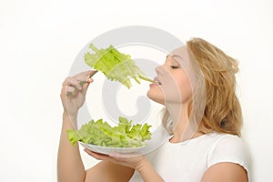 Girl with green lettuce