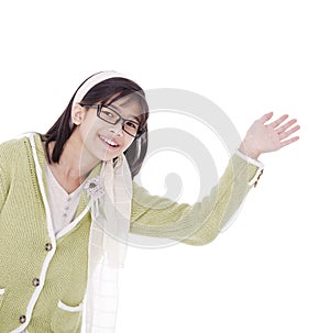 Girl in green sweater waving a warm welcome, isolated photo