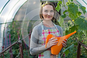 Girl in a greenhouse