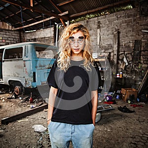 Girl in a grunge garage