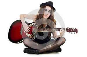 The girl with a guitar - grunge style