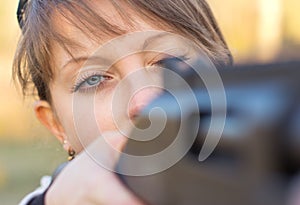 Girl with a gun for trap shooting