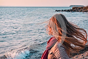 Girl with hair blowing in the wind