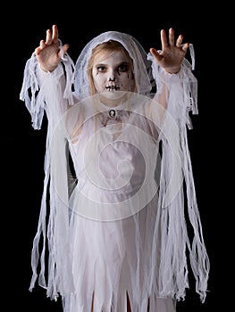 Girl in Halloween ghost costume