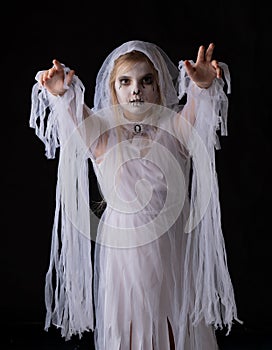 Girl in Halloween ghost costume