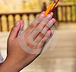 Girl hand beg respect to statue