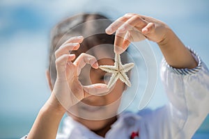 Girl Hands Holding A Starfish