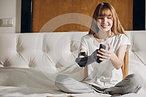 Girl is happy as she is able to use a prosthetic hand as a real one