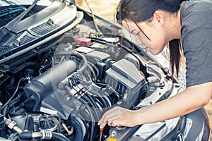 Girl happy checking car LPG engine