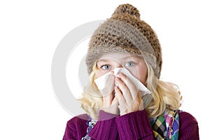 Girl has sniff and blow her nose with a tissue