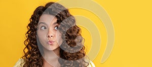 girl has wavy hairdo. portrait of frizz child. express positive emotion. Child face, horizontal poster, teenager girl