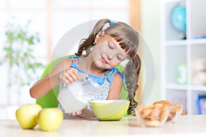 Girl having breakfast