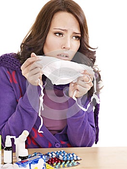 Girl having flu taking pills