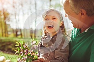 Girl having fun with grandpa