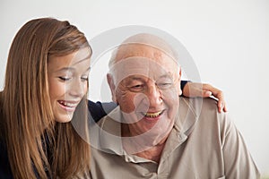 Girl having fun with her grandfather