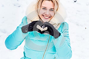 Girl having fun outdoors in snow