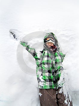 Girl having fun playing snow