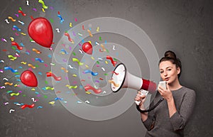 girl having fun, shouting into megaphone