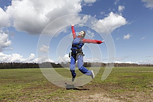 Girl is having fun before skydive jump.