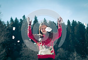 Girl having fun in the snow.