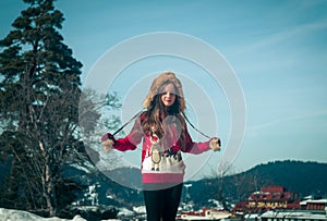 Girl having fun in the snow.