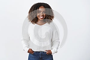 Girl having fun talking to interesting person. Portrait of joyful charismatic smiling african-american young woman with