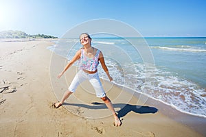 Girl having fun on the tropical beach