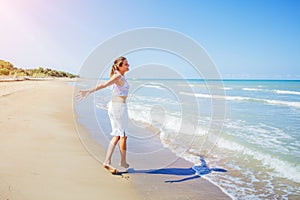 Girl having fun on the tropical beach