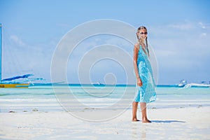 Girl having fun on tropical beach photo