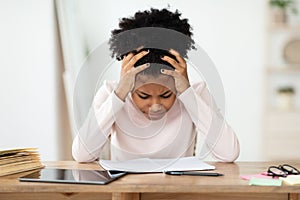 Girl Having Hard Time Doing Homework Online, Sitting Depressed Indoors photo