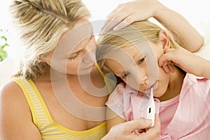 Girl Having Her Temperature Measured