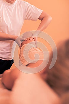 Girl having legs massage