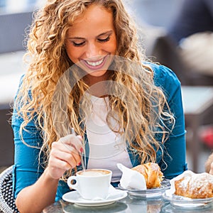 Girl Having a Traditional Italian Breakfast