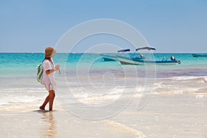 Girl having a walk in Playa Paraiso, Mayan Riviera photo