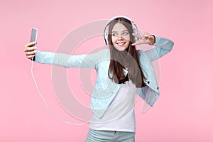 Girl with headphones and smartphone