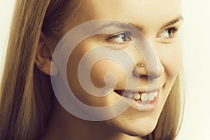 Girl with healthy face skin and teeth